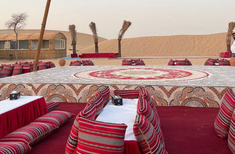 Dubai Safari Desert stage show carpet tent palm trees in dubai